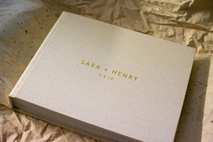Wedding Album with custom cover, personalisation embossing in a natural linen fabric cover material.